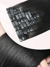 Extensions de cheveux à clips noir naturel en cheveux humains (7 ou 8 pièces)